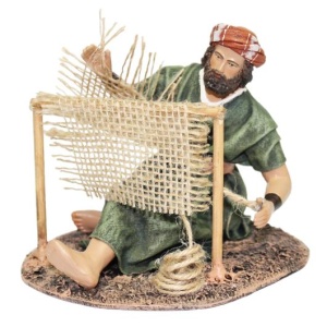 Pastor cosiendo sacos