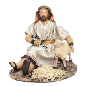 Pastor esquilando oveja