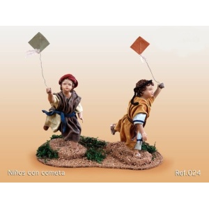 Niños con cometa en barro lienzado