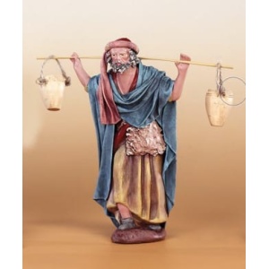 Pastor con cubos barro lienzado