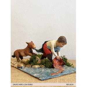 Niño con perro en barro lienzado