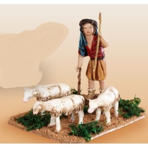 Niño con rebaño en barro lienzado