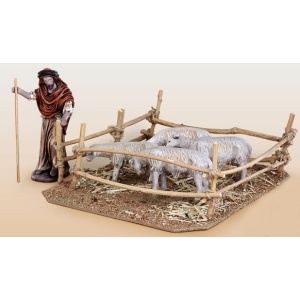 Pastor con redil de ovejas en barro lienzado