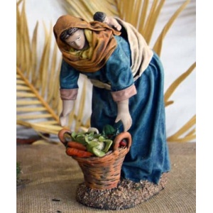 Pastora con niño en la espalda barro lienzado