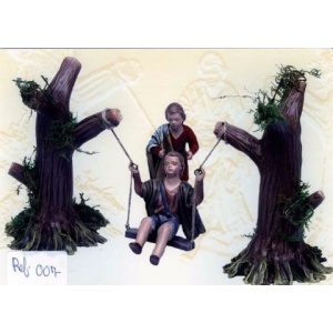 Niños con columpio en barro lienzado