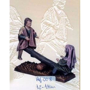 Niños con balancín en barro lienzado