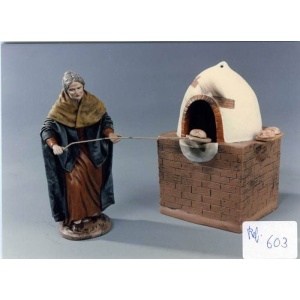 Pastora con horno en barro y tela