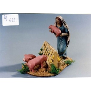 Pastora con cerdos en barro lienzado