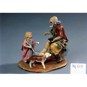 Niño dando limosna a pastor en barro lienzado 14cm