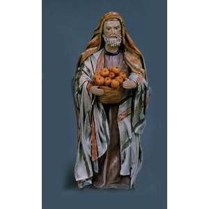 Pastor con cesto de naranjas en barro lienzado