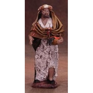 Pastor con cesto de fruta en barro lienzado