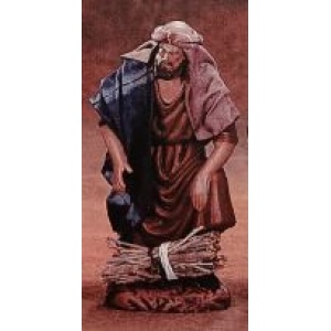 Pastor adorando con leña en barro lienzado