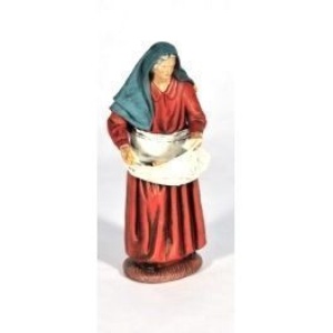 Pastora dando de comer en barro lienzado