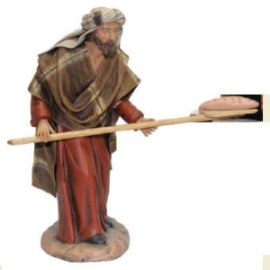 Panadero con pala en barro lienzado