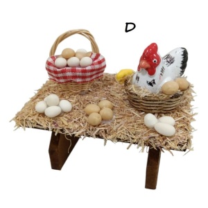 Mesa con cestas de huevos para figuras de 10cm y 12cm