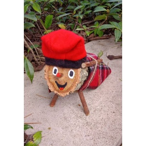 Tió de Nadal Alegre 10cm*6cm con manta y bastón